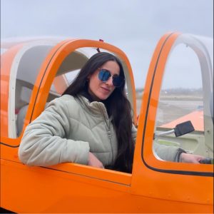 Captain Nadeen Qatameen Sitting in Airplane